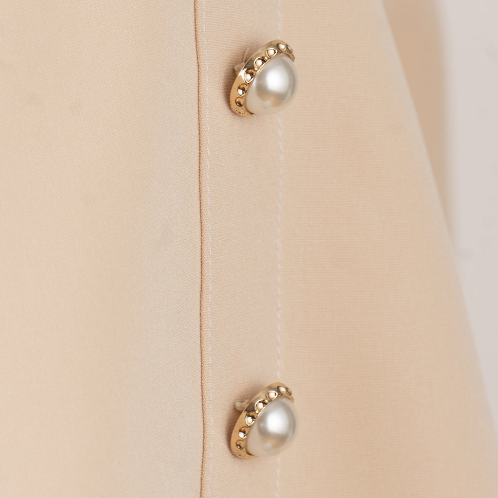 Beige Dress with White Ruffles and Decorative Buttons